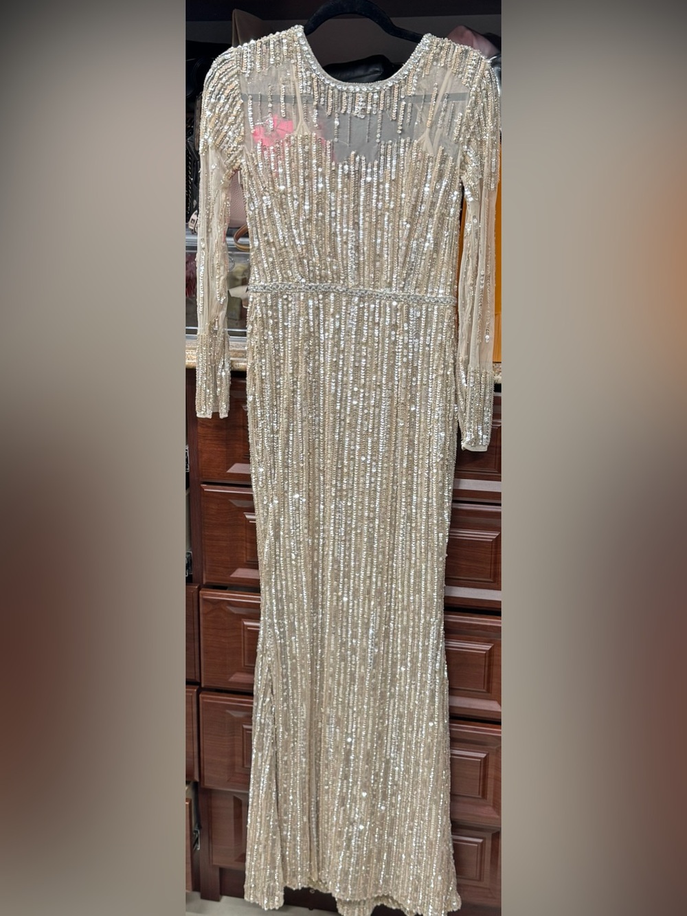 Elegant Sequin Long-Sleeve Evening Gown in Champagne